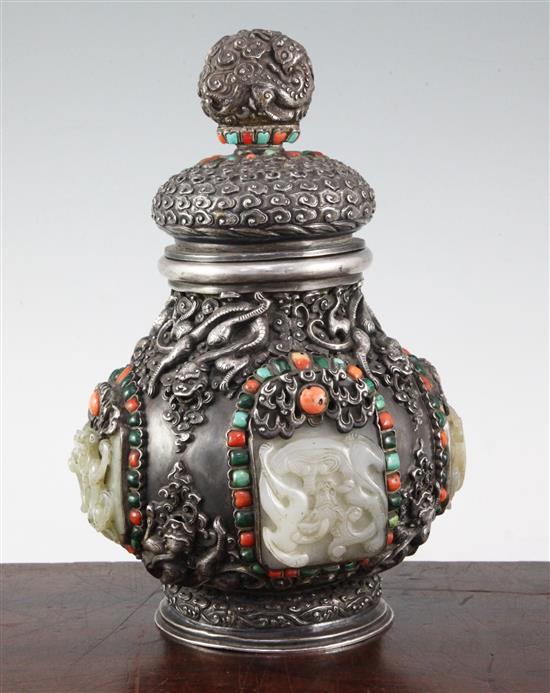 A Tibetan silver, jade, coral, malachite and turquoise mounted ritual jar and cover, 19th century, 25.5cm